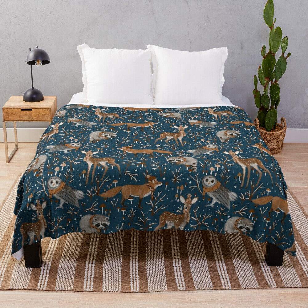 Navy plush blanket with woodland animal design