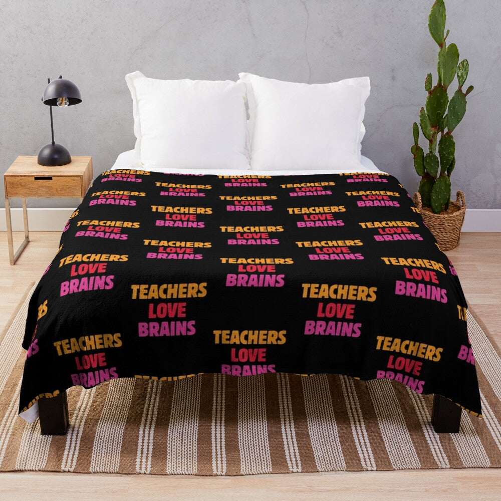 Plush blanket with a "Teachers Love Brains" design, perfect for teacher appreciation