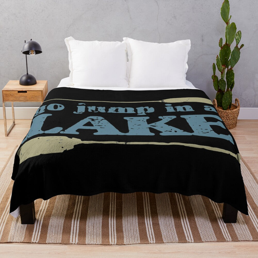 Plush blanket with "Go Jump in A Lake" design for nature and lake lovers