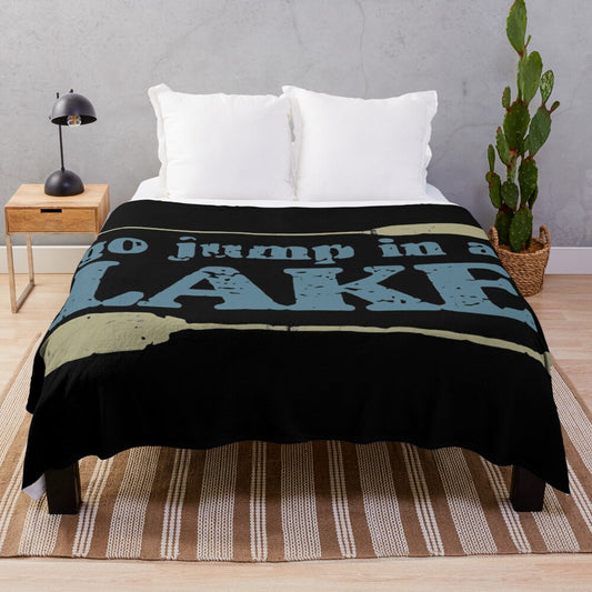 Plush blanket with "Go Jump in A Lake" design for nature and lake lovers