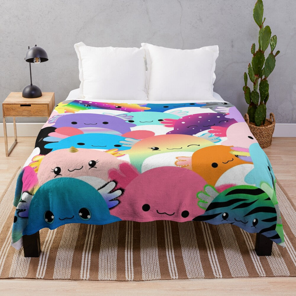 Colorful plush blanket featuring a family of cute axolotl creatures