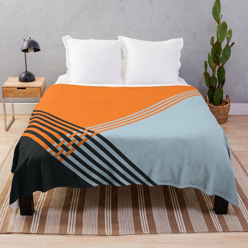 Papaya orange plush blanket with motorsports-inspired design