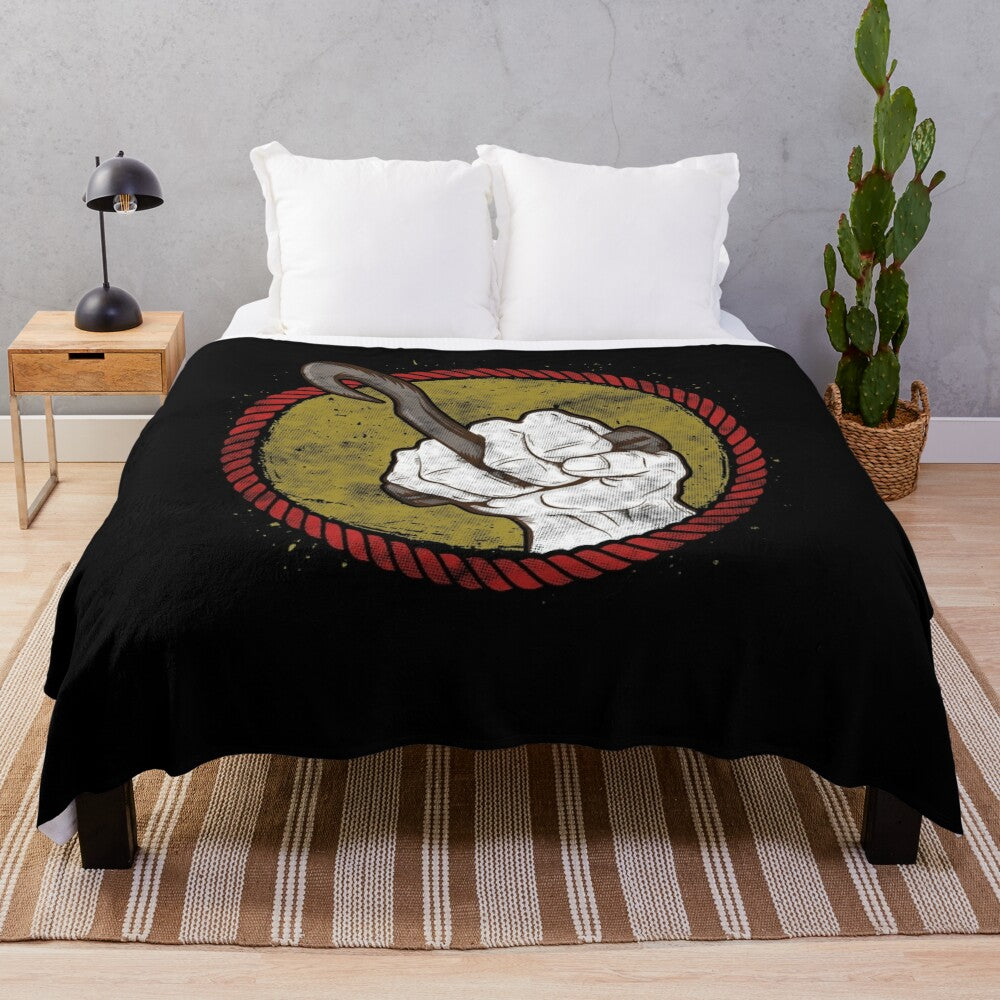 Graphic plush blanket featuring a longshoreman hook design