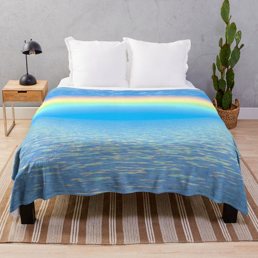 Colorful rainbow plush blanket with abstract patterns