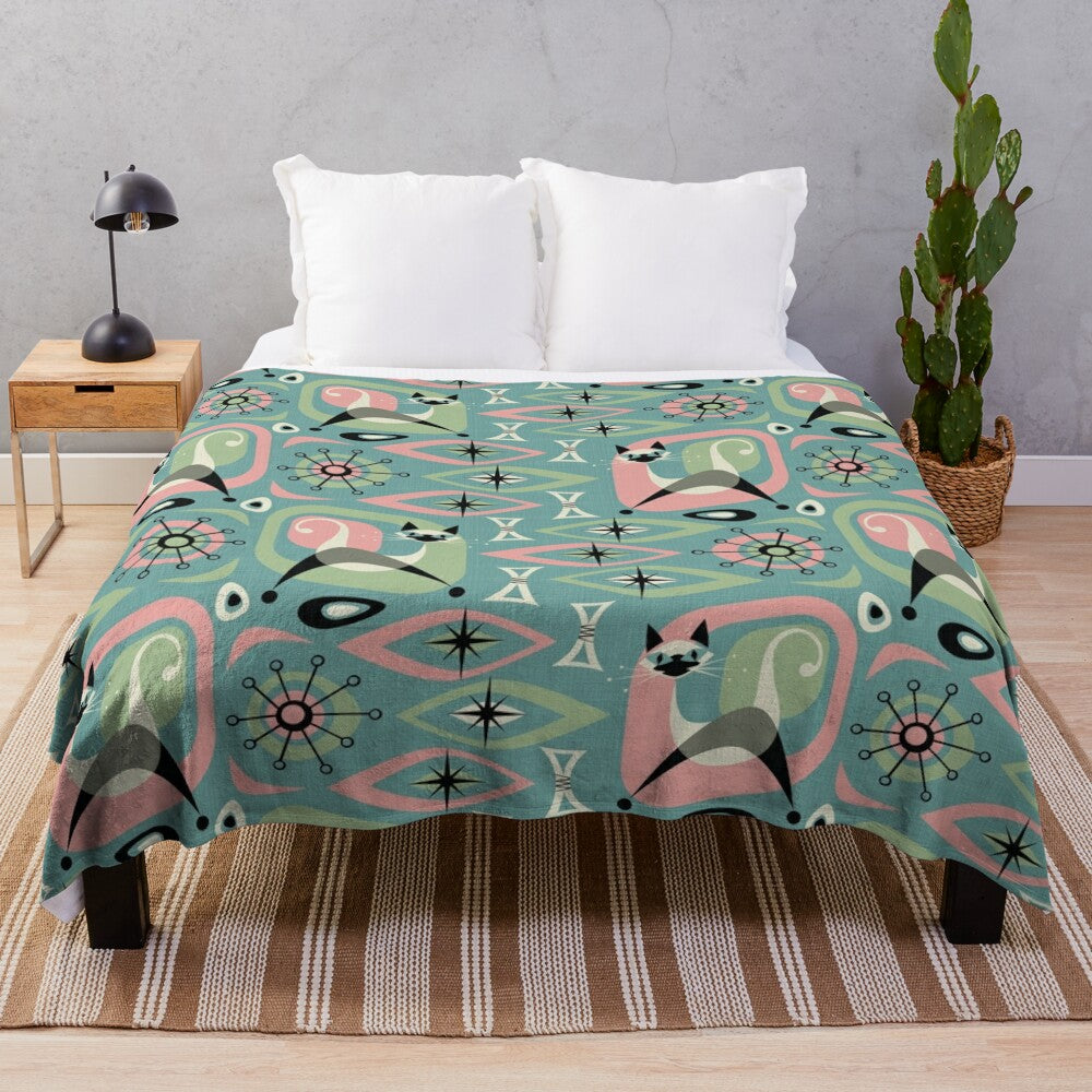 Siamese cat abstract design on a plush blue blanket