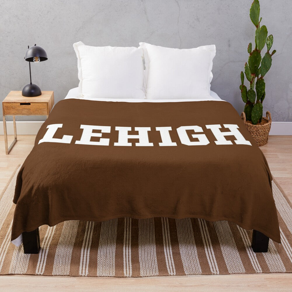 Soft and cozy plush blanket featuring the Lehigh Mountain Hawks wordmark logo