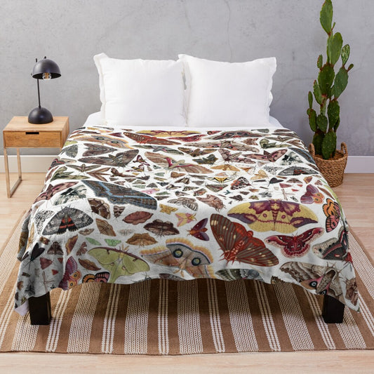 Watercolor moths of North America pattern on a plush blanket