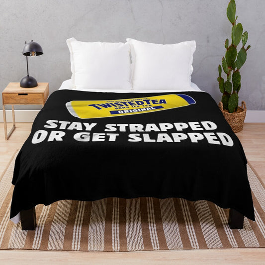 Twisted Tea Plush Blanket featuring the "Stay Strapped or Get Clapped" design