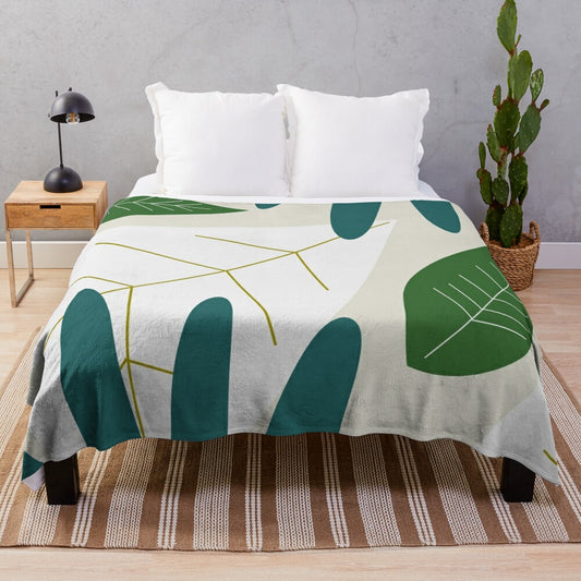 Tropical plush blanket with minimalist green leaf pattern