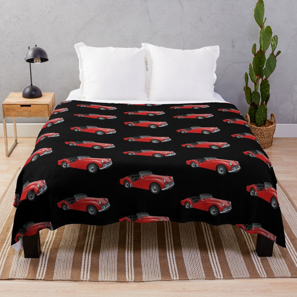 Plush blanket with a classic Triumph TR3 sports car design