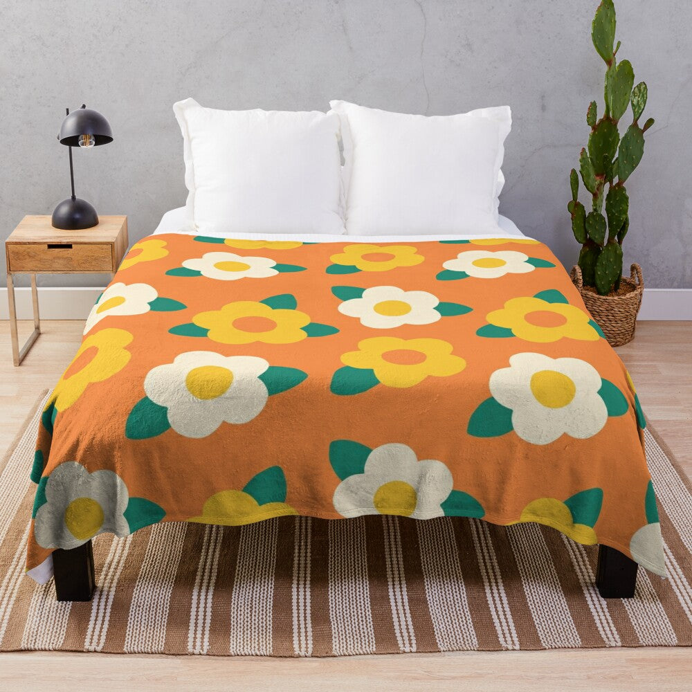 Colorful yellow and white daisy floral pattern on a plush blanket