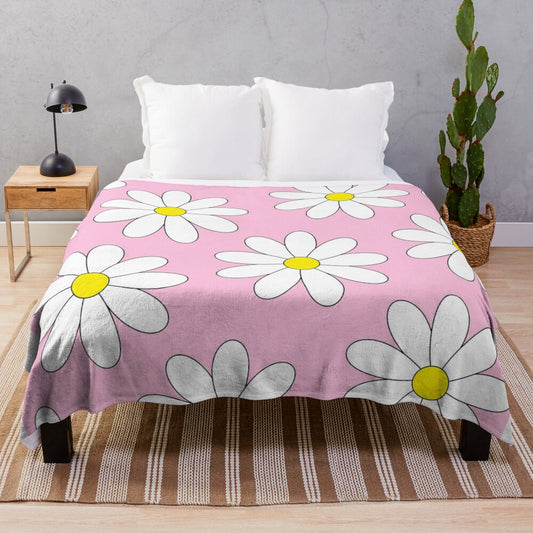 Daisies Plush Blanket featuring a pink, yellow, and white floral design