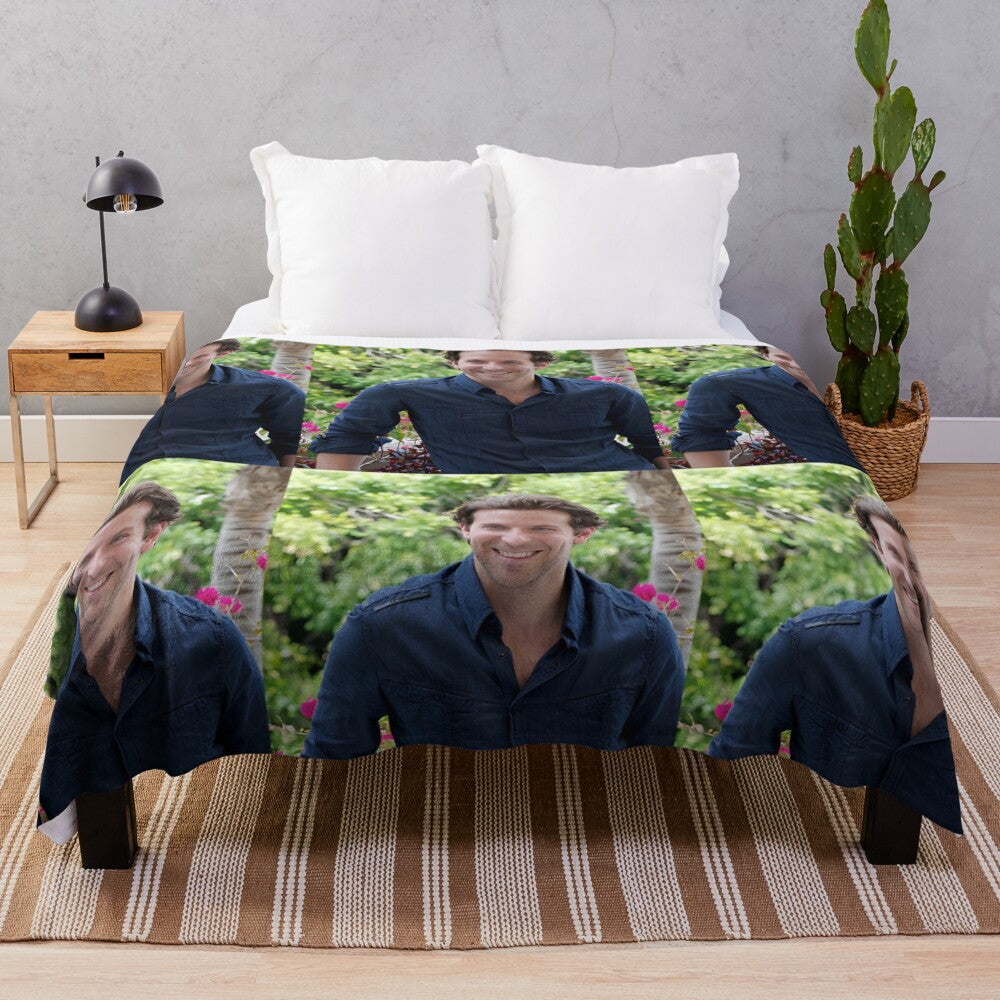 Plush blanket featuring the image of acclaimed actor Bradley Cooper