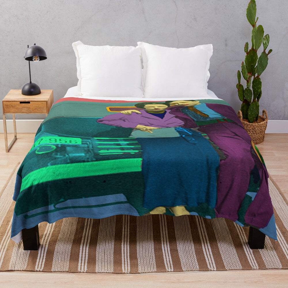 Colorful pop art plush blanket featuring Bonnie and Clyde inspired abstract patterns