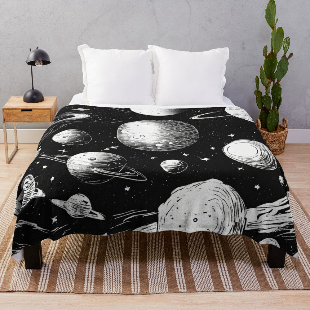 Plush blanket featuring a galaxy design