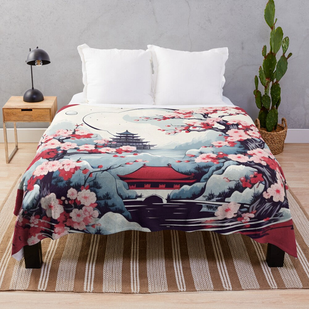 Cozy plush blanket featuring a Japanese-inspired design with a tower silhouette and cherry blossoms