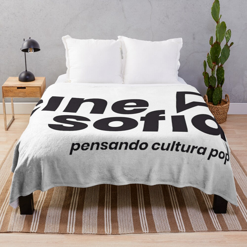 Geometric and trippy plush blanket with Cine Sofia and Filosofia patterns