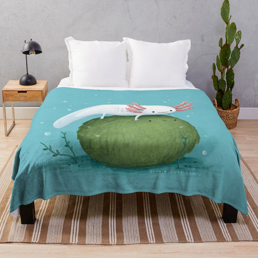 Soft, green plush blanket featuring a cute axolotl sitting on a moss-covered ball