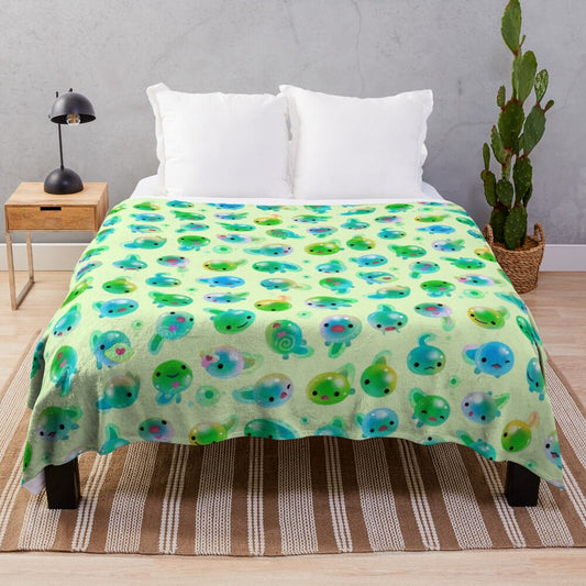 Soft and cozy plush blanket featuring a cute candy-colored tadpole design