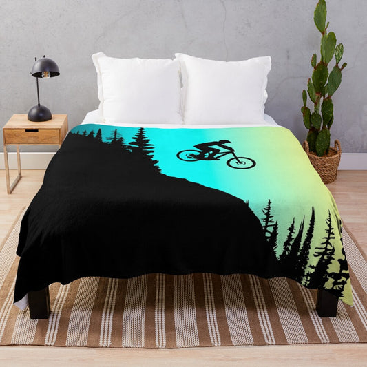 Colorful plush blanket featuring mountain bike design