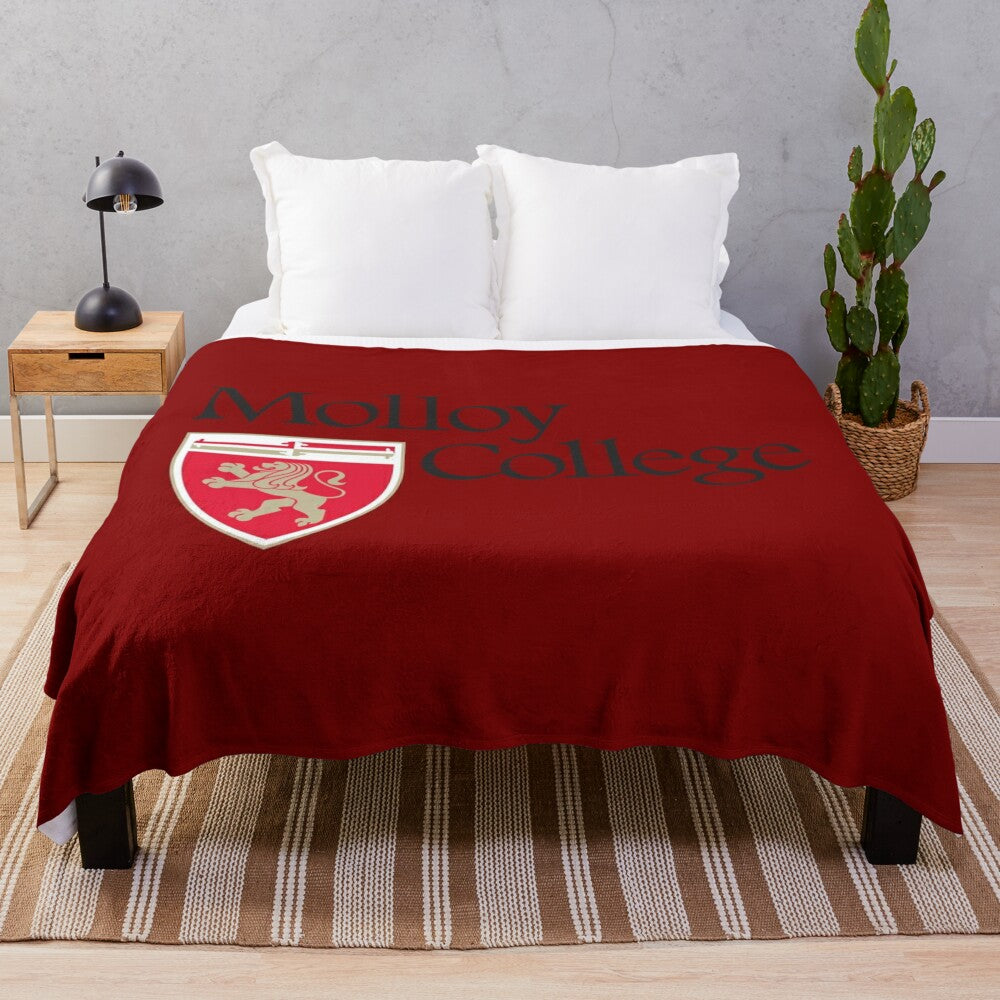 Molloy College plush blanket with mascot logo