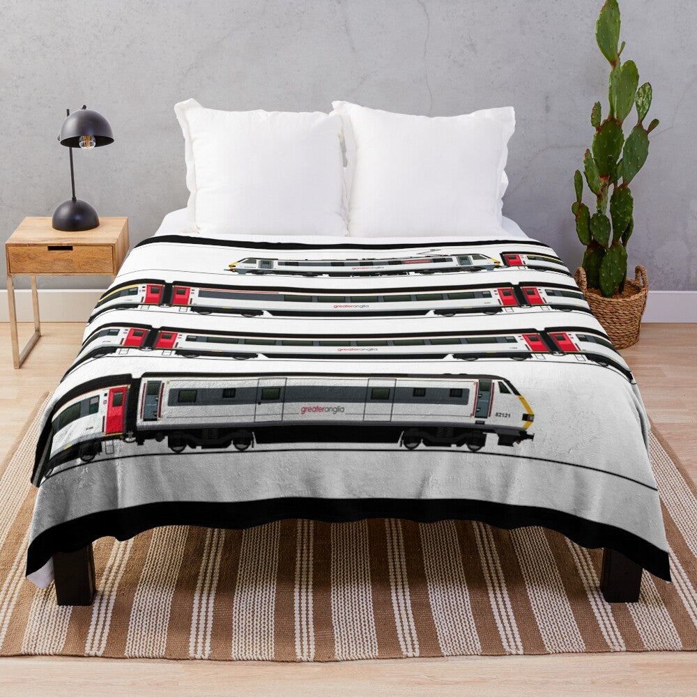 Plush blanket featuring a vintage-style illustration of a Class 90 locomotive from the Greater Anglia rail network