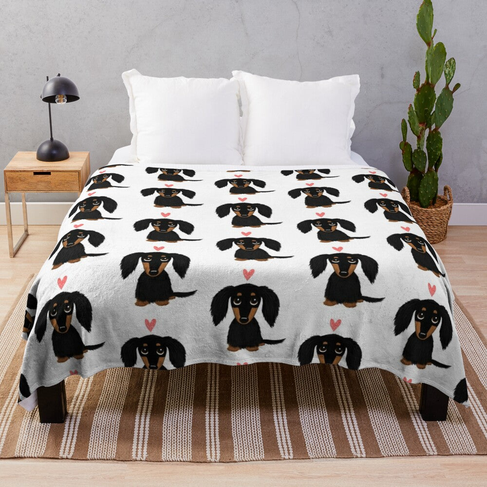 Black and tan long-haired dachshund cartoon dog with heart design plush blanket