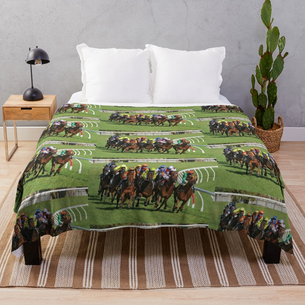 Plush blanket with horse racing action design