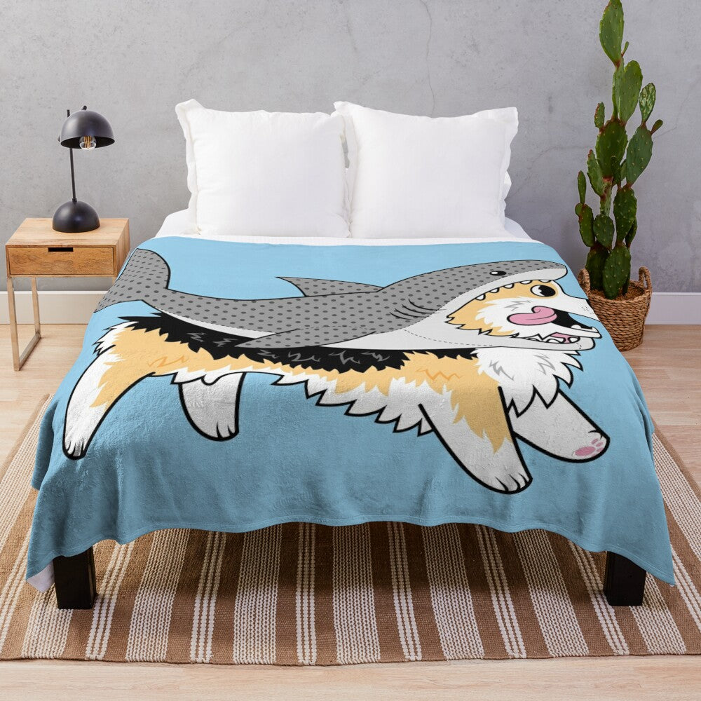 Corgi dog wearing a shark costume on a plush blanket