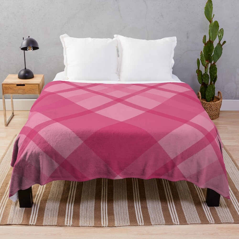 Scottish tartan plush blanket in pink and red tones