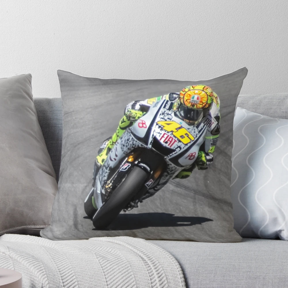 Valentino Rossi riding his Yamaha motorcycle at Laguna Seca racetrack in 2010