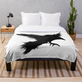 Valkyrie-inspired plush blanket featuring a crow and raven design with a Norse typography quote