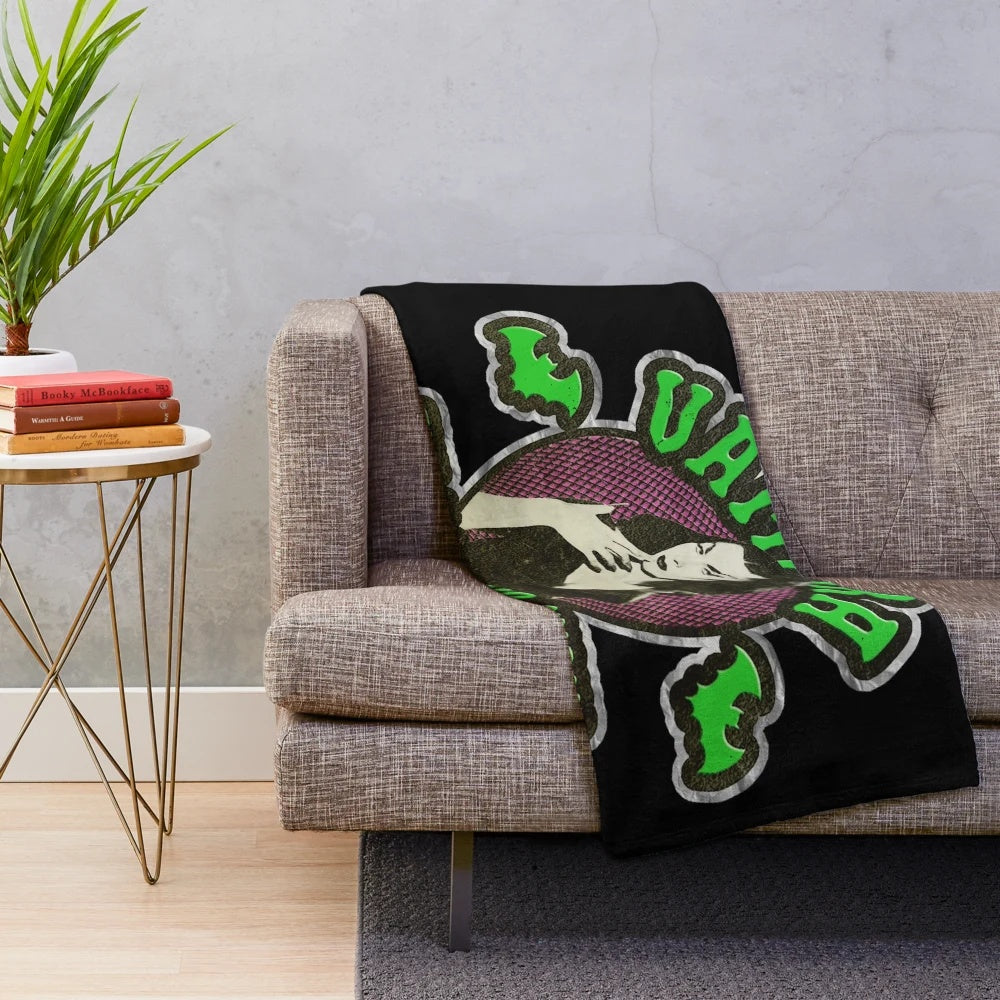 Vampira-inspired gothic horror plush blanket with distressed, vintage, and retro design