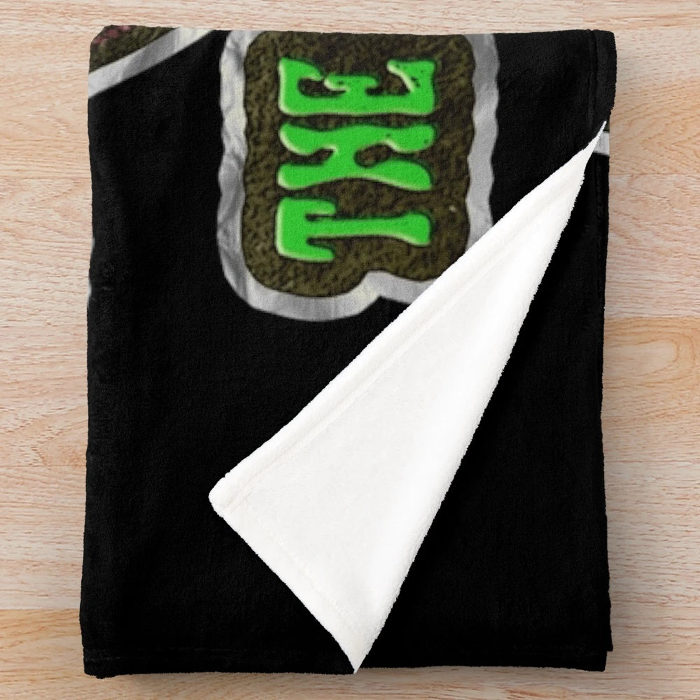 Vampira-inspired gothic horror plush blanket with distressed, vintage, and retro design