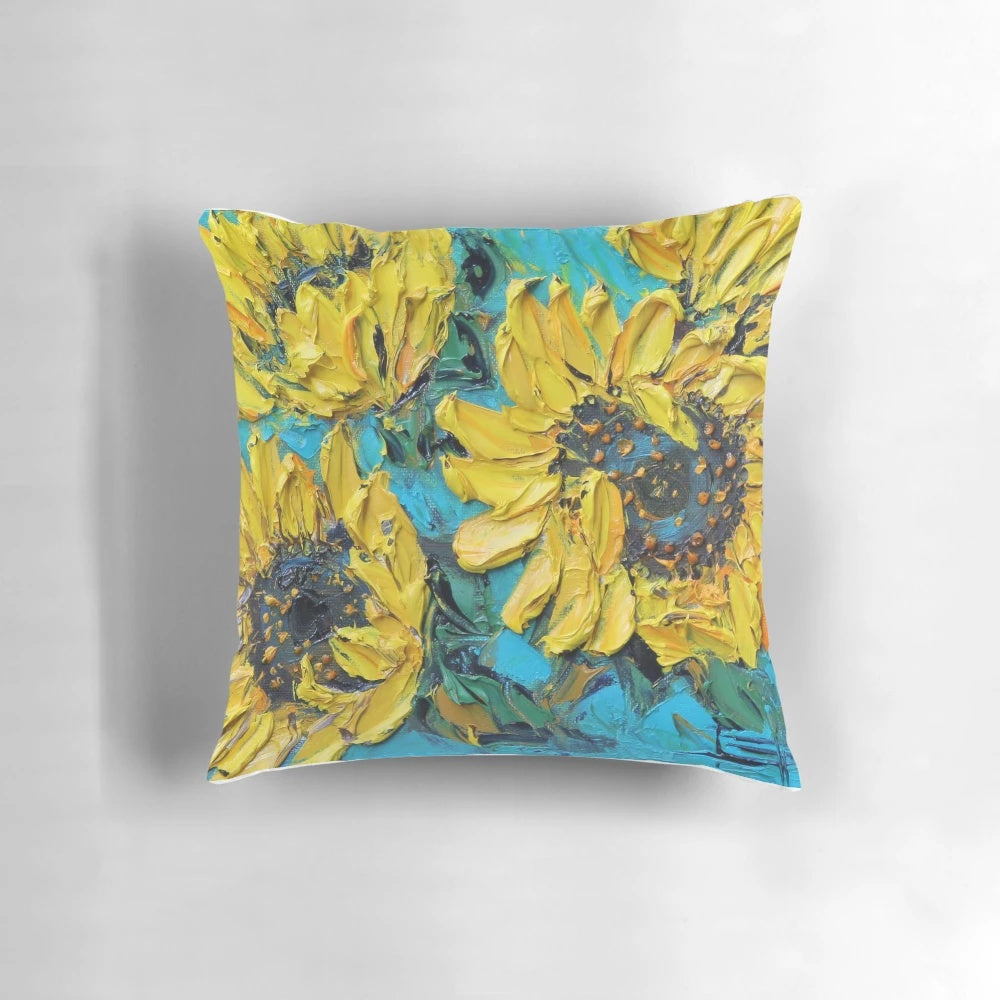 Vibrant throw pillow featuring a Van Gogh-inspired sunflower design in shades of yellow and turquoise.
