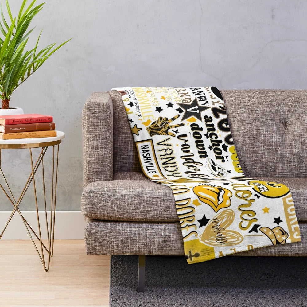 Vanderbilt University inspired plush blanket with black and gold design