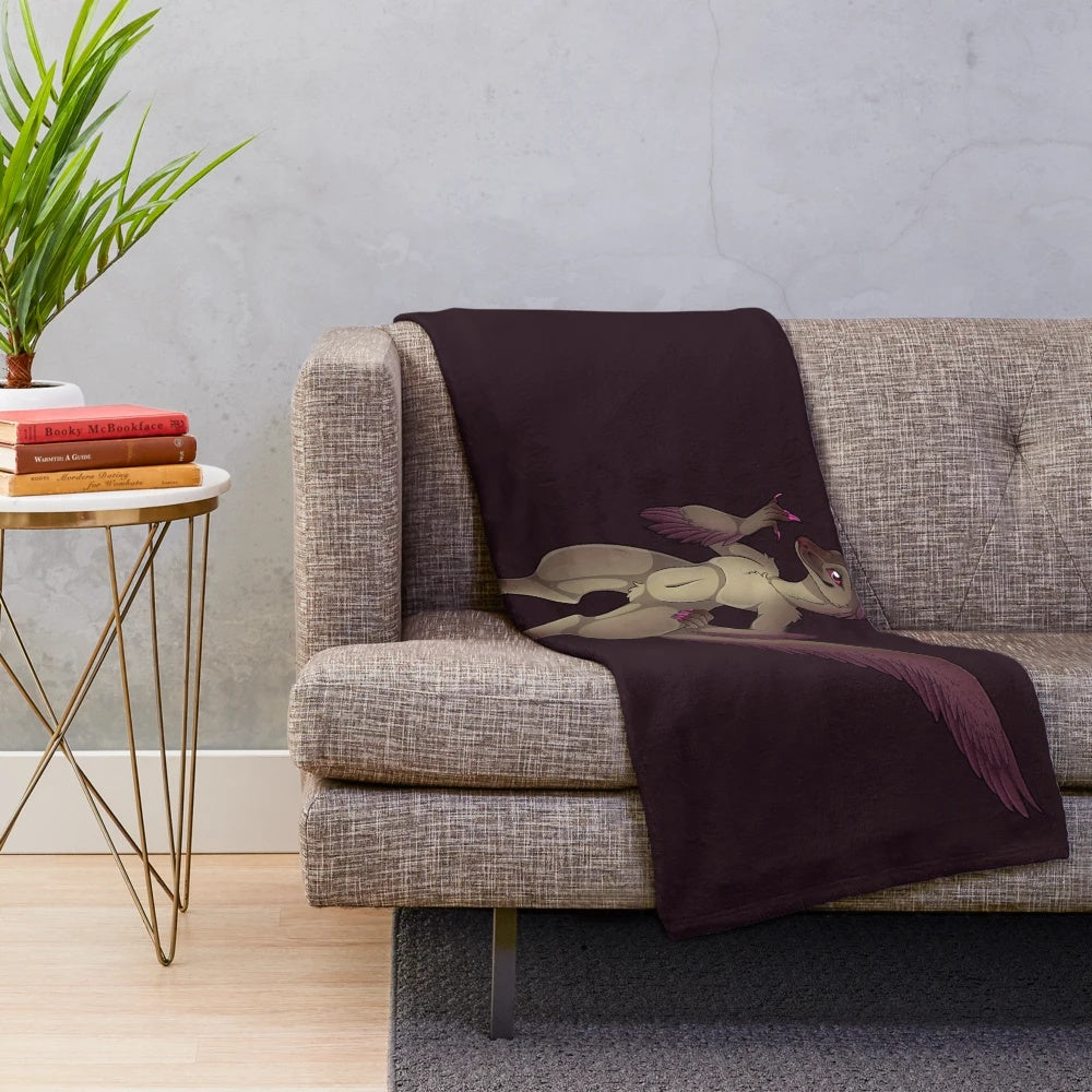 Vermillion Velociraptor-themed plush blanket featuring a smiling, scaly creature