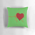 A three-in-one Christmas pillow featuring the Grinch, hearts, and holiday designs