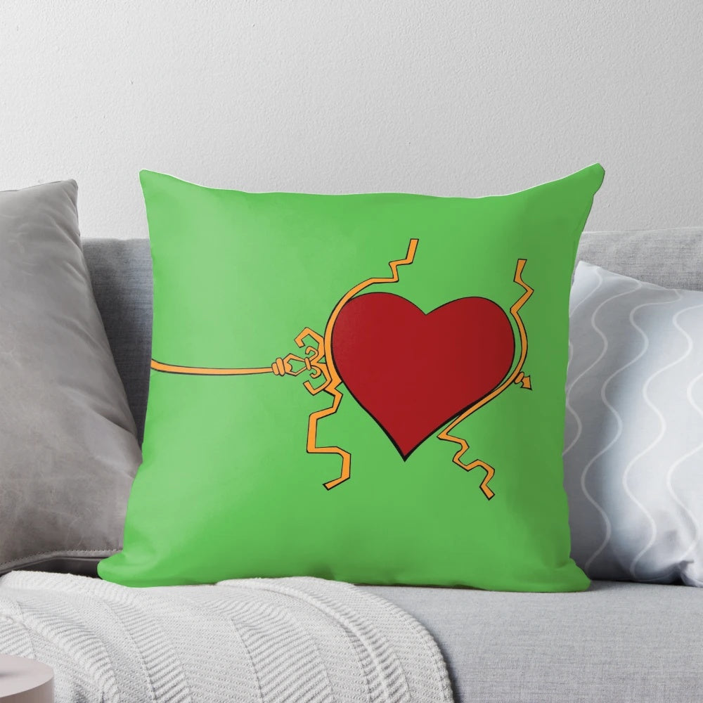 A three-in-one Christmas pillow featuring the Grinch, hearts, and holiday designs