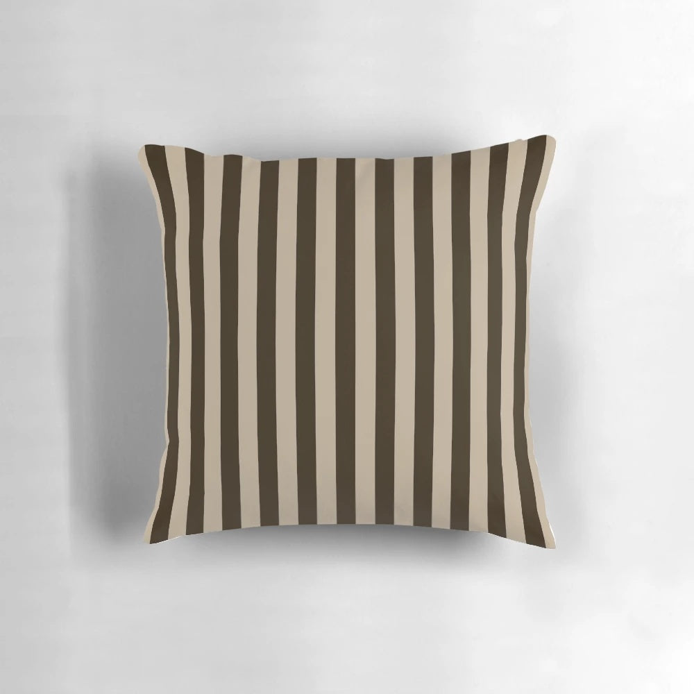 Vertical brown and beige striped decorative pillow with a modern, textured design.