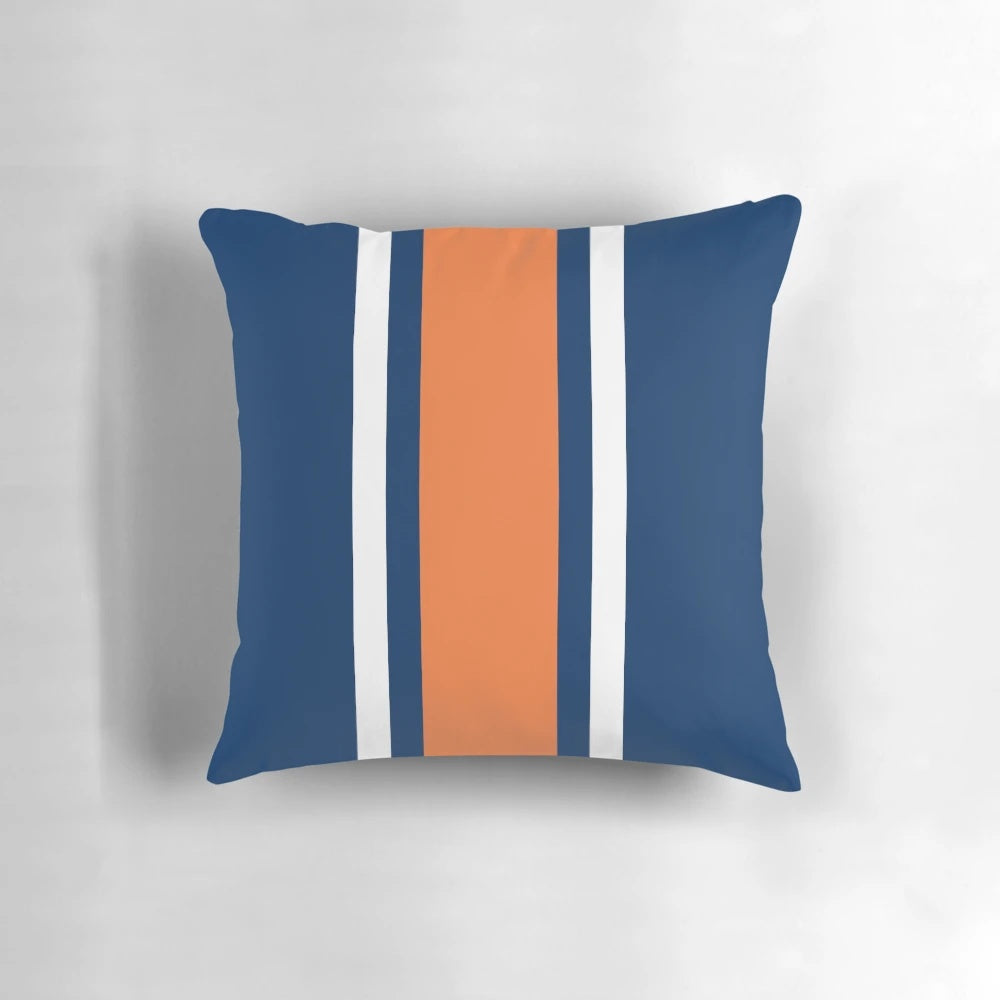 Vertical power stripe pillow in orange, white, and navy colors