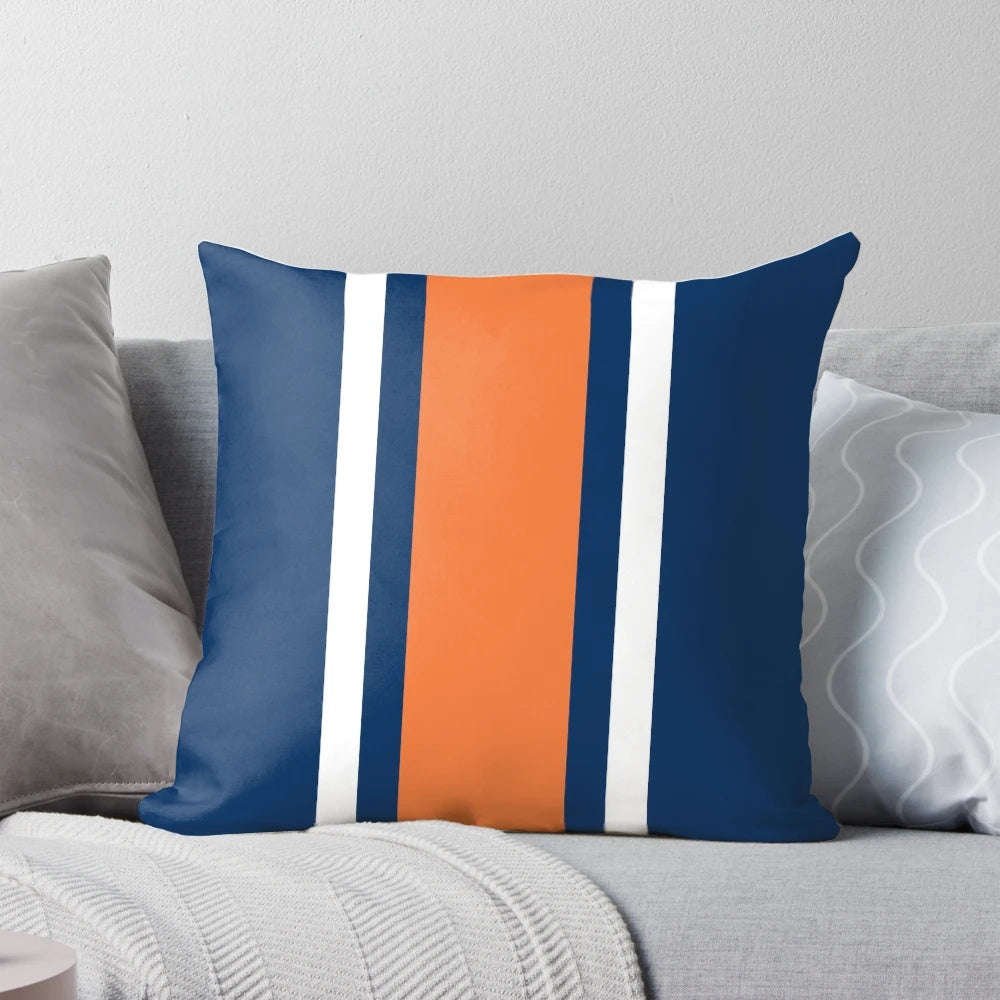 Vertical power stripe pillow in orange, white, and navy colors
