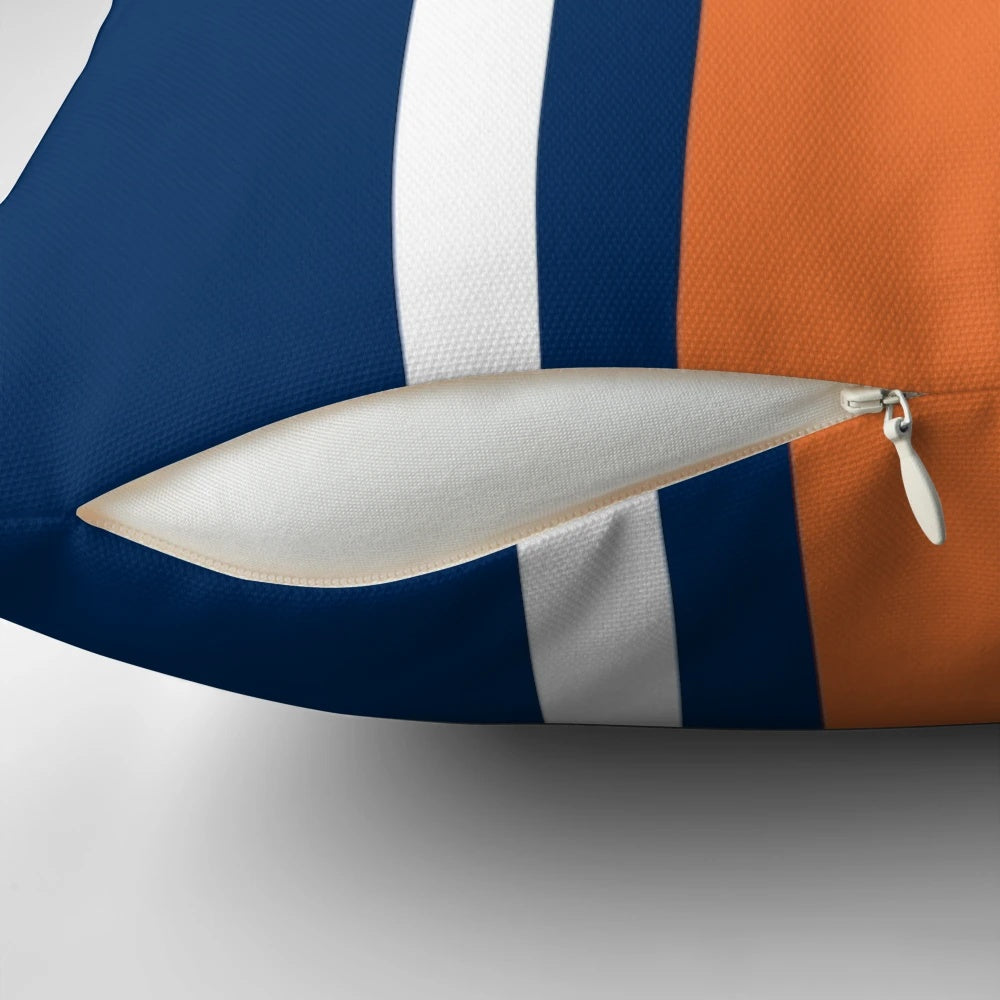 Vertical power stripe pillow in orange, white, and navy colors