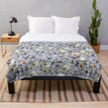 Plush blanket featuring a vibrant 100 dollar bills pattern