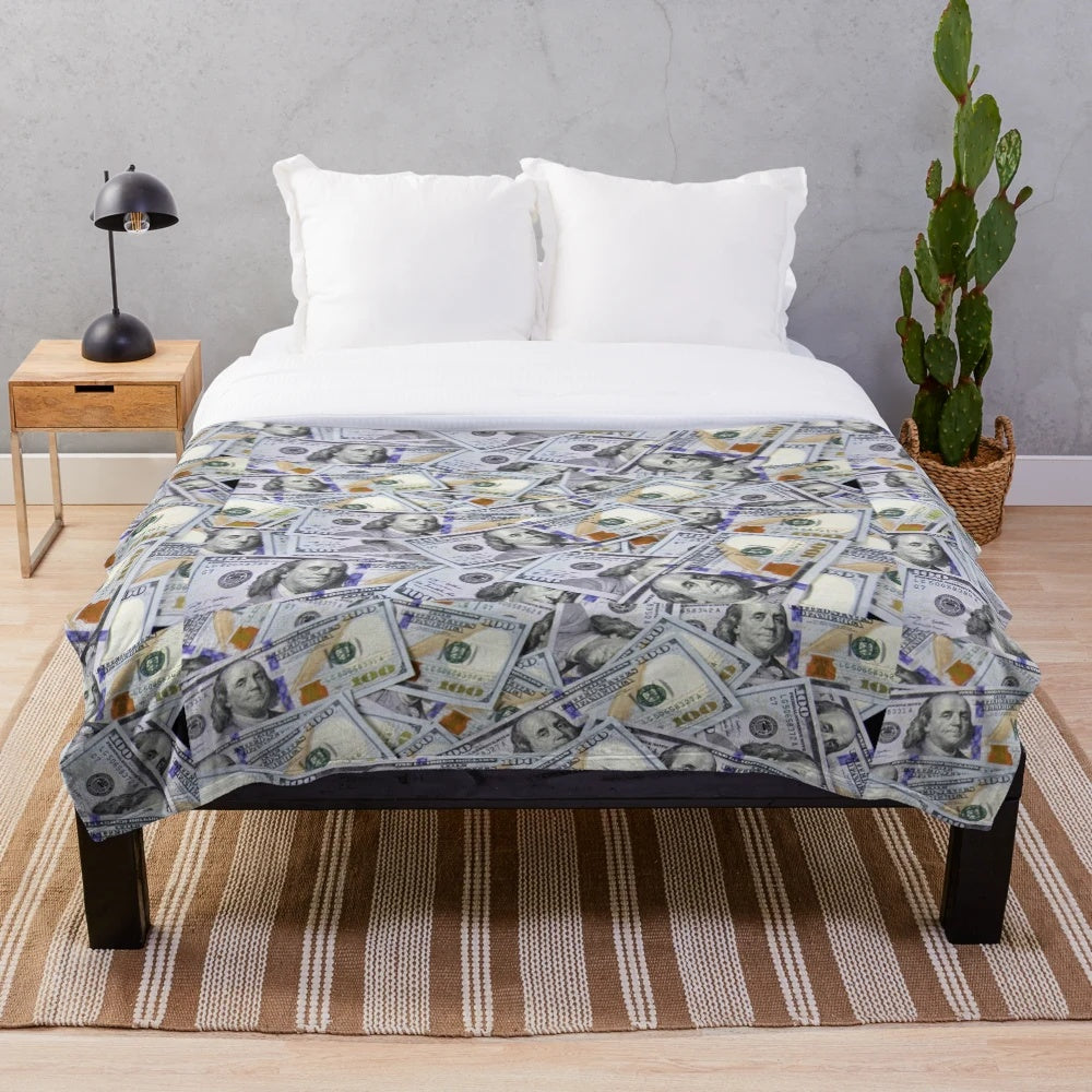 Plush blanket featuring a vibrant 100 dollar bills pattern