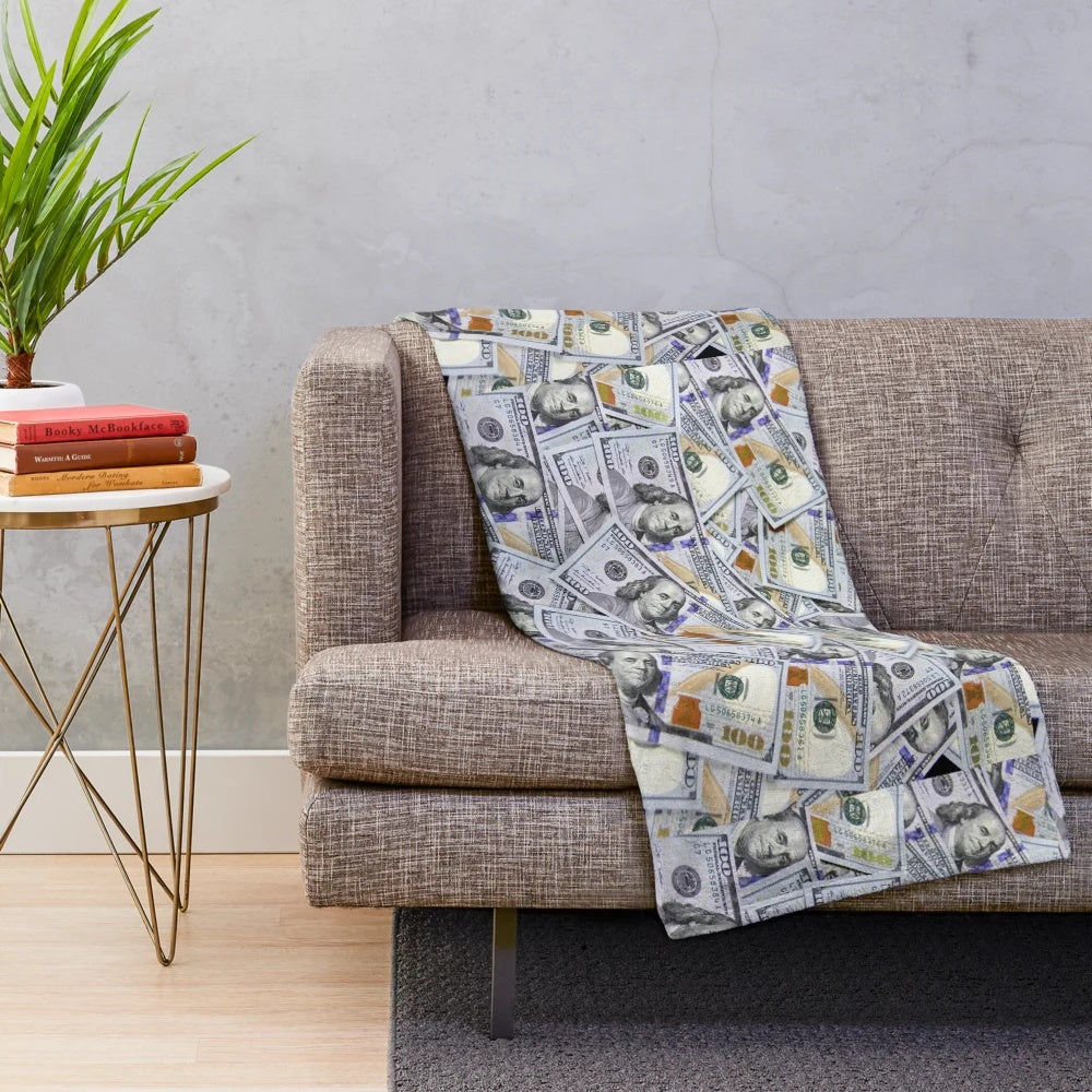 Plush blanket featuring a vibrant 100 dollar bills pattern