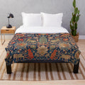 Plush blanket with a vibrant 17th century Persian-style rug pattern featuring animals and floral designs