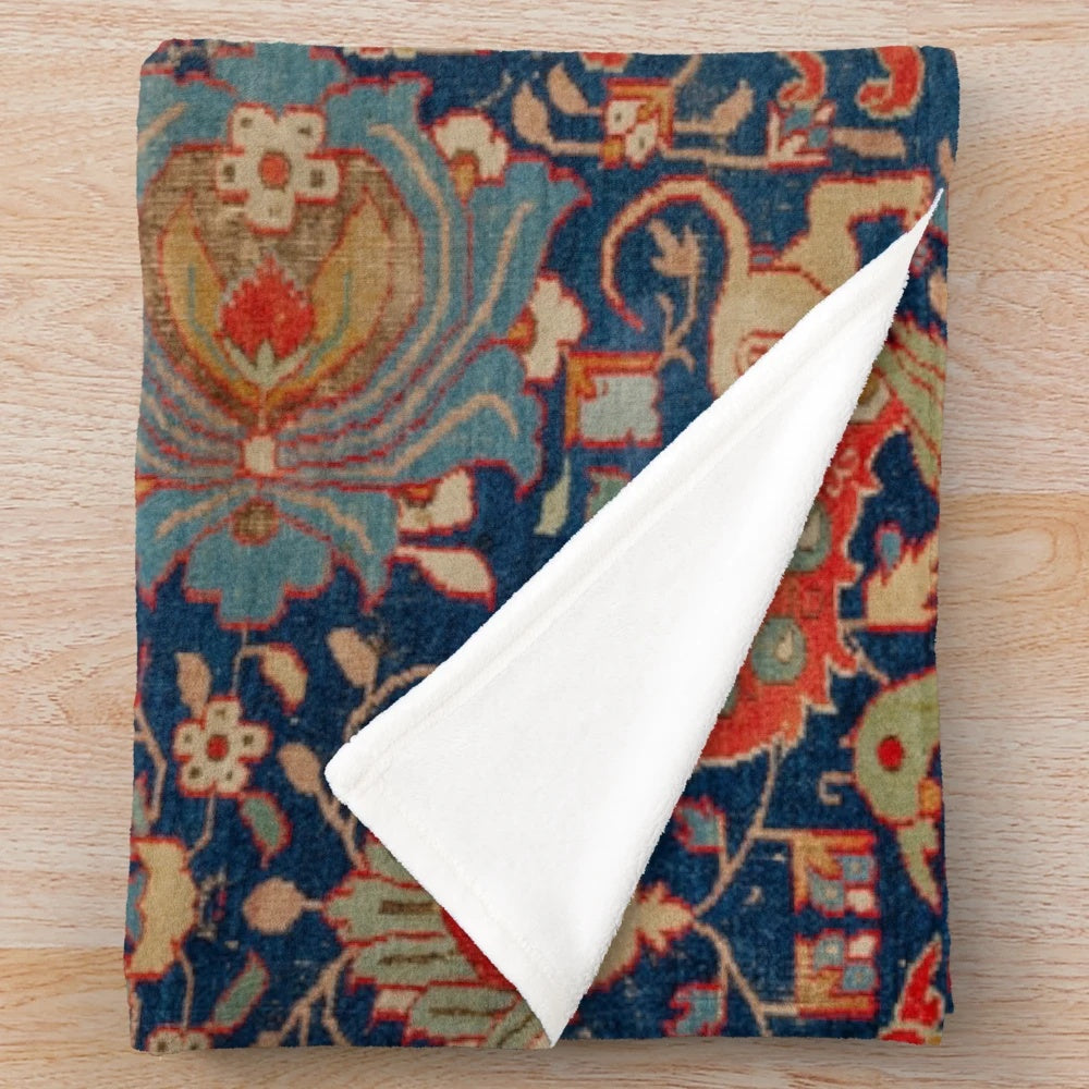 Plush blanket with a vibrant 17th century Persian-style rug pattern featuring animals and floral designs