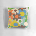 Colorful 70s floral blue pillow featuring a vintage-inspired flower design