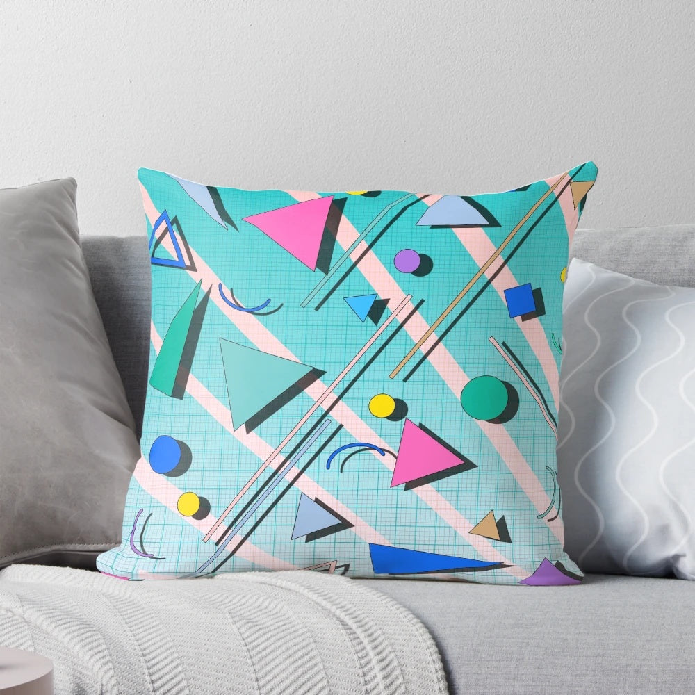 Colorful 80s pop art inspired pillow with a retro Memphis design pattern